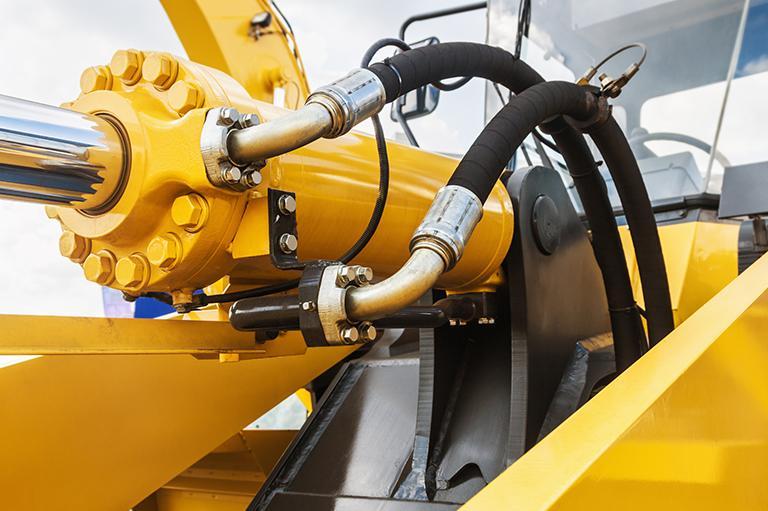 Siłownik hydrauliczny żółty